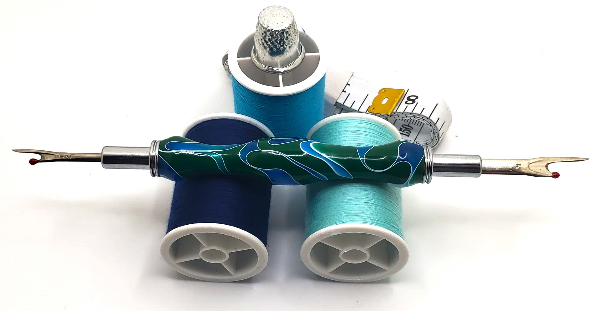 Sewing Seam Ripper – Emerald Green and Blue and Silver Epoxy. The seam ripper ends can flip and back into the shaft for protection.